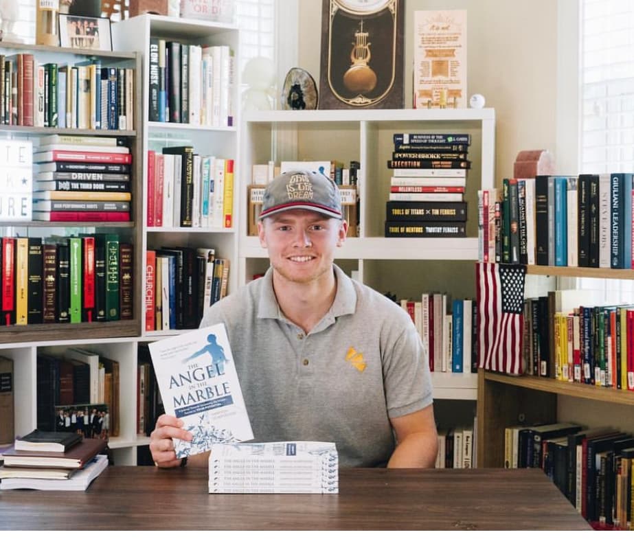 Harrison holding The Angel in the Marble
